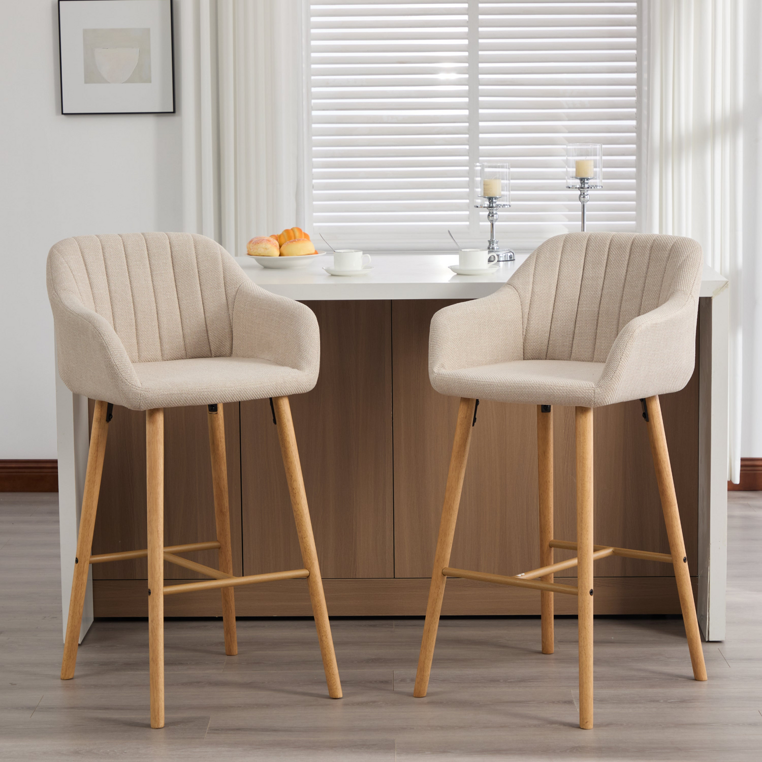 Modern linen upholstered bar stool with back, armrests, footrest, and solid wood legs from Start2Finish furniture.