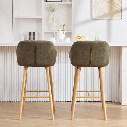 Modern linen upholstered bar stool with back, armrests, footrest, and solid wood legs from Start2Finish furniture.