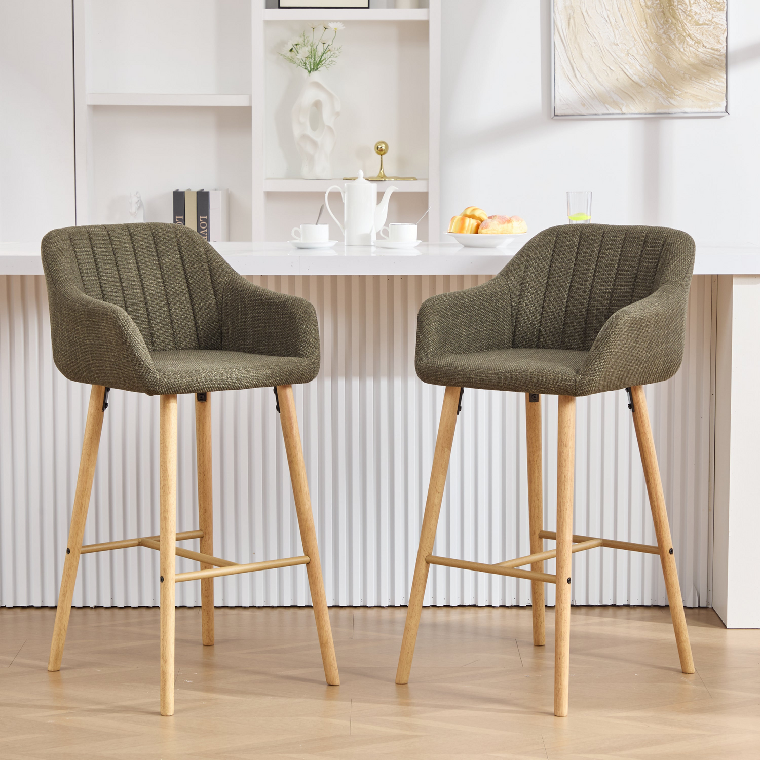 Modern linen upholstered bar stool with back, armrests, footrest, and solid wood legs from Start2Finish furniture.