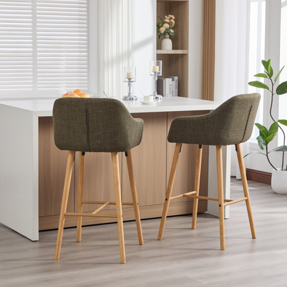 Modern linen upholstered bar stool with back, armrests, footrest, and solid wood legs from Start2Finish furniture.