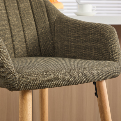 Modern linen upholstered bar stool with backrest, armrests, footrest, and solid wood legs from Start2Finish furniture.