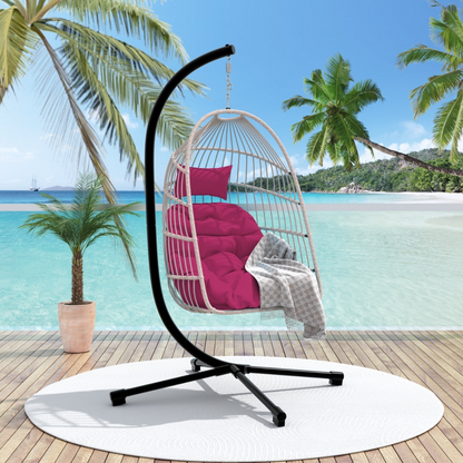 Outdoor hanging egg chair with stand, patio wicker rattan swing with cushion, by Start2Finish, for relaxing outdoor furniture.