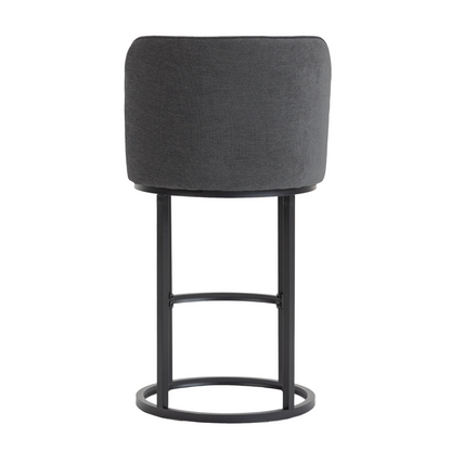 Modern barrel-shaped upholstered accent bar stool with backrest, featuring stylish wooden legs for home seating.