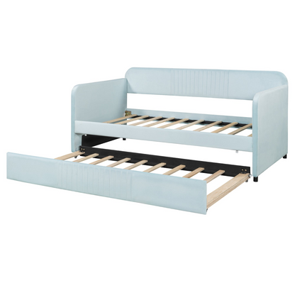 Start2Finish upholstered twin size daybed sofa bed with trundle and wood slat base, shown in a cozy, modern furniture setting.