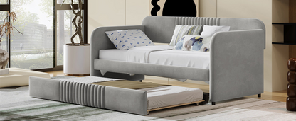 Start2Finish twin size upholstered daybed sofa bed with trundle and wood slat base, featuring plush fabric and wooden frame.