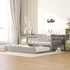 Start2Finish wood daybed with trundle and fence guardrails, shown in a cozy home bedroom setting with bedding and pillows