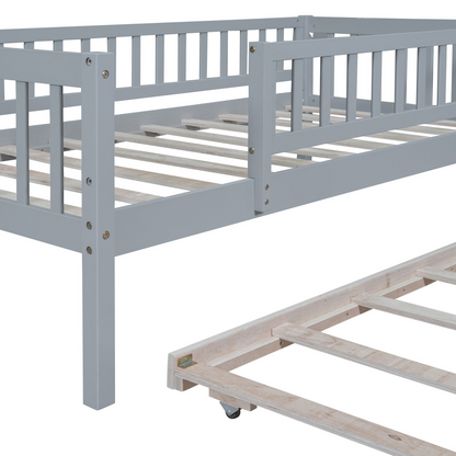 Wood daybed with trundle and fence guardrails by Start2Finish, shown in a cozy bedroom setting with bedding and pillows