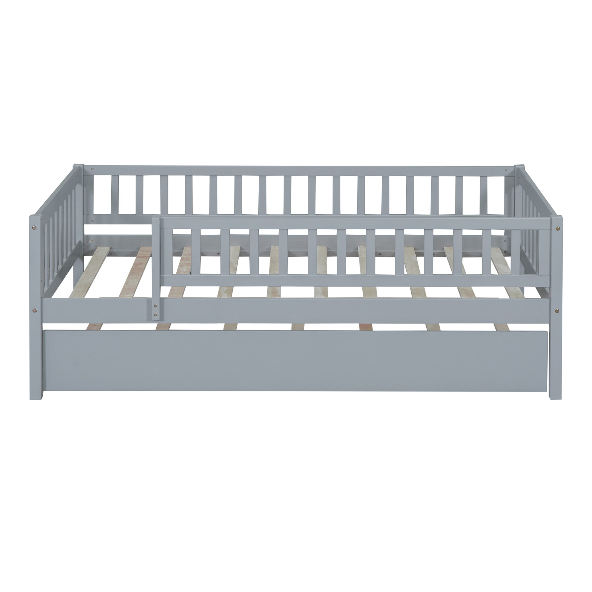 Wood daybed with trundle and fence guardrails by Start2Finish, shown in a cozy bedroom setting with bedding and pillows.