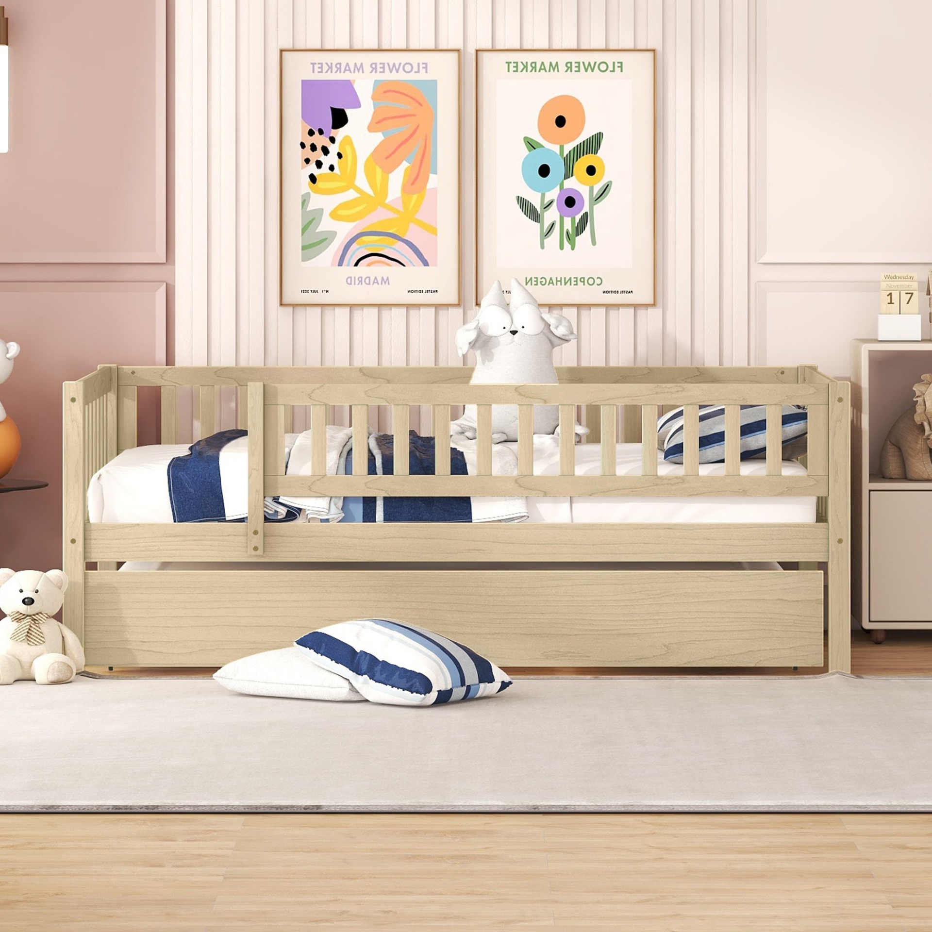 Start2Finish wood daybed with trundle and fence guardrails, shown in a cozy bedroom setting with bedding and pillows.