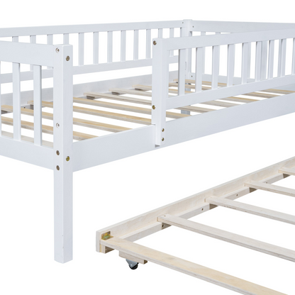 Start2Finish wood daybed with trundle and fence guardrails, shown in a cozy bedroom setting with pillows and bedding.