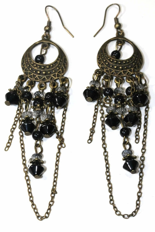 Silver Hestia gypsy style chandelier earrings featuring intricate metalwork and dangling beads on a plain background.