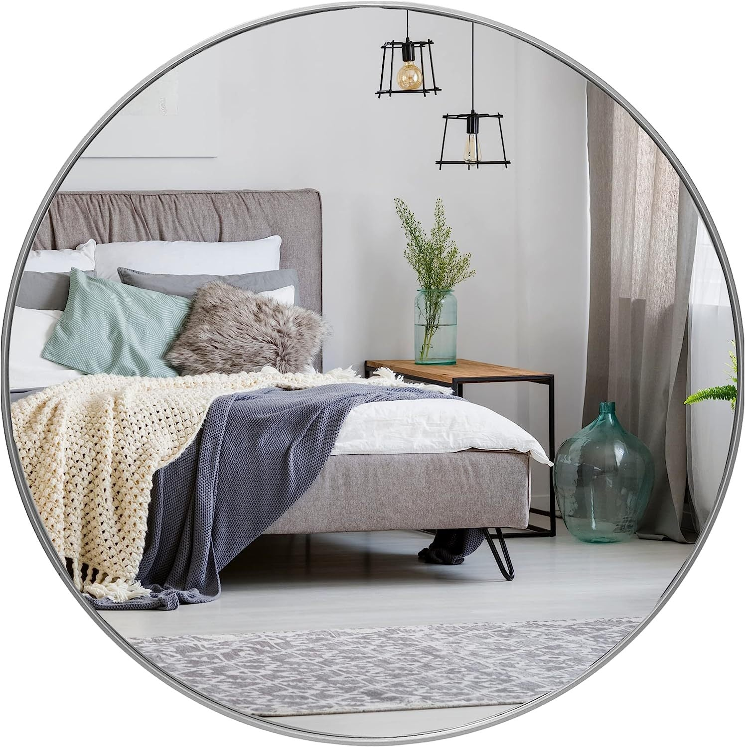 Round metal-framed bathroom mirror, 36 inches, wall-mounted vanity mirror with sleek finish, ideal for modern bathroom decor.