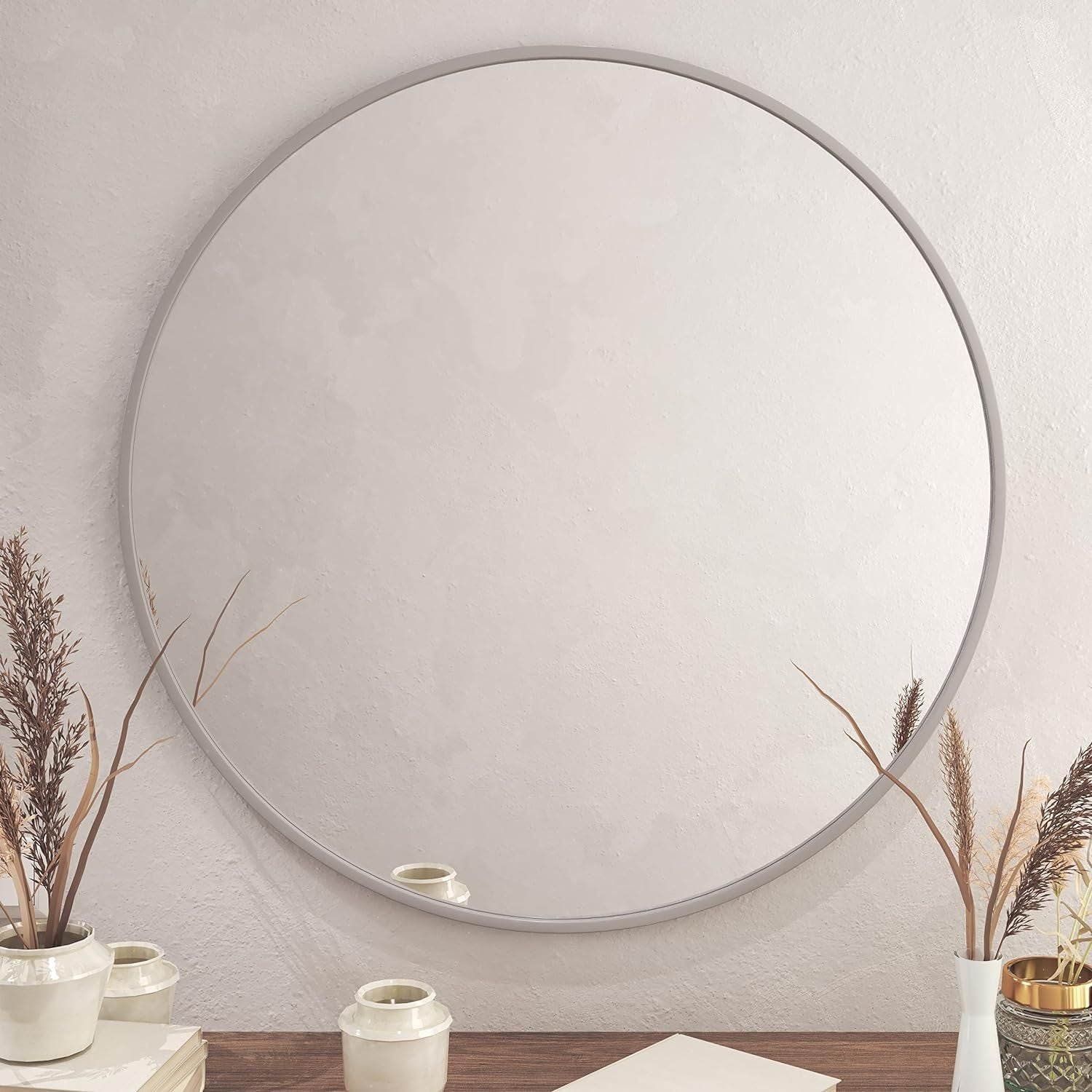 Start2Finish 36-inch round metal framed wall-mounted bathroom mirror for vanity or wall decor.