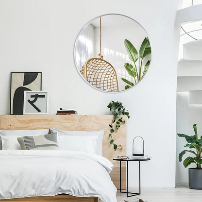 Start2Finish 36-inch round metal framed wall-mounted bathroom mirror with sleek design for vanity or wall decor.