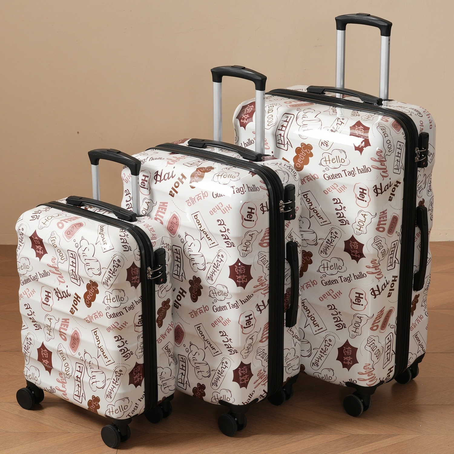 Three-piece hardshell luggage set by Start2Finish with spinner wheels and TSA locks, shown with all three suitcases stacked together.