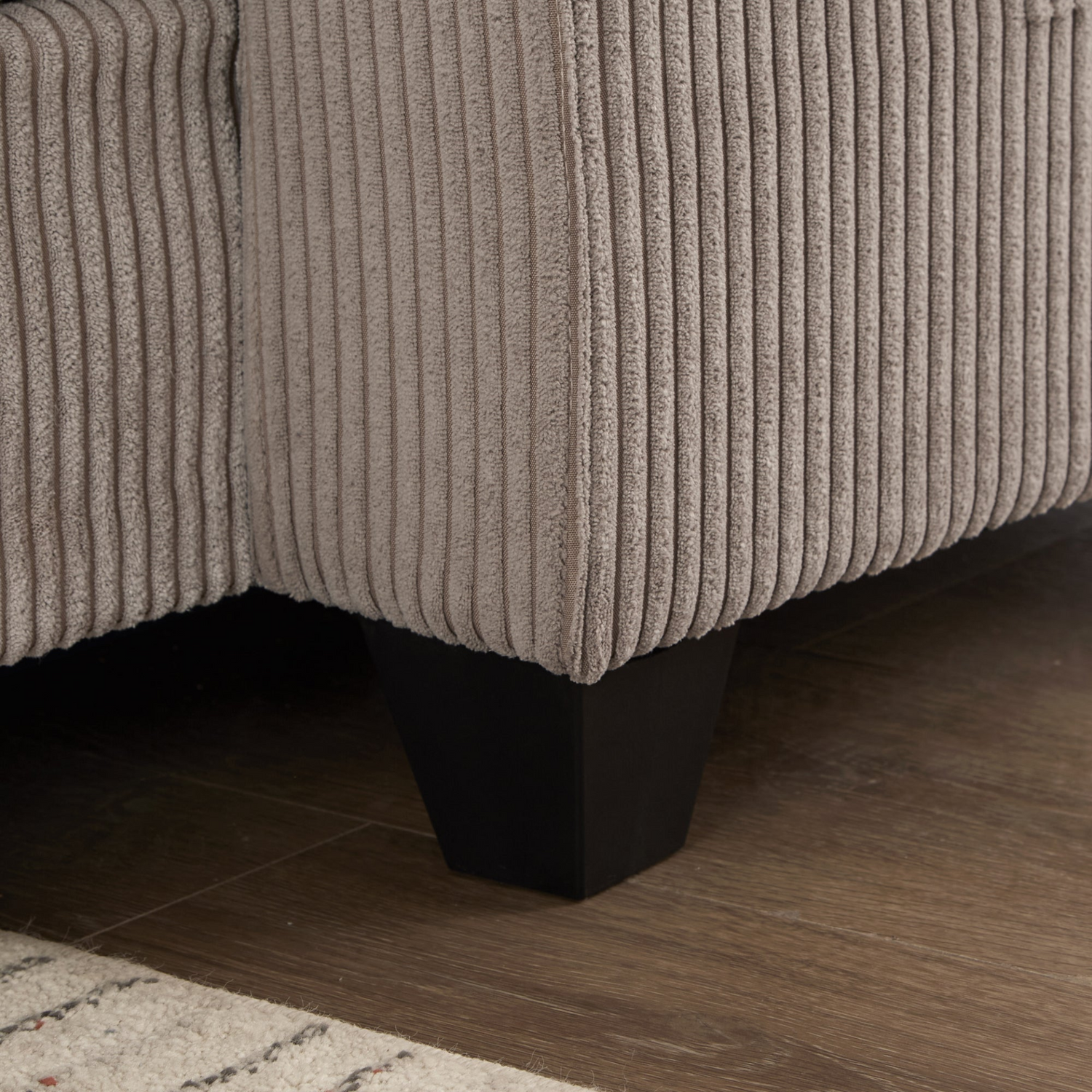 Start2Finish convertible chaise lounge sofa chair with USB ports, cup holders, phone holder, and storage in a modern living room setting.