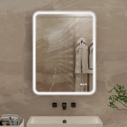 Rectangular framed dimmable LED bathroom vanity mirror with anti-fog feature, mounted on a wall in a modern bathroom setting.