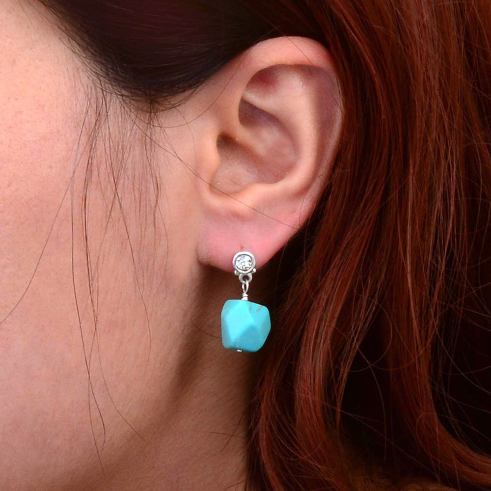 Sterling silver earrings with sparkling cubic zirconia and turquoise nugget accents, stylish jewelry by Start2Finish