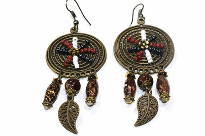 Silver Hestia Dream Catcher Bead Work Earrings featuring intricate bead details and bohemian style, hanging with silver hooks.