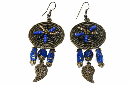 Silver Hestia Dream Catcher bead work earrings with intricate thread and bead designs hanging from silver hooks.