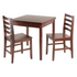 Start2Finish Pulman 3-piece extension table set with two ladder back chairs, showcasing the wooden dining table and seating.
