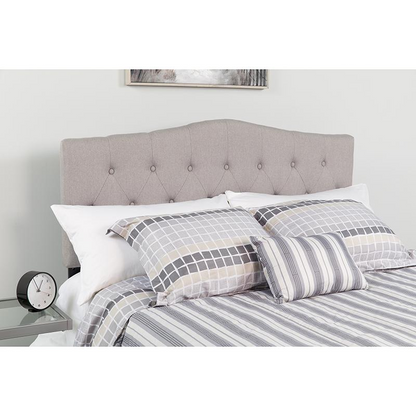 Light gray tufted upholstered twin size headboard from Start2Finish with button-tufted design and soft fabric upholstery.