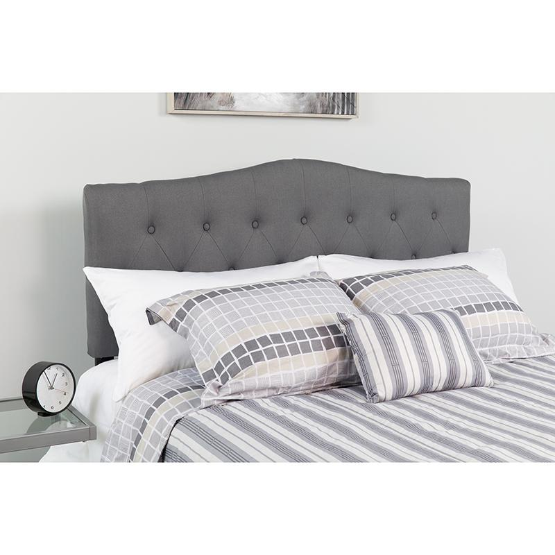 Dark gray tufted upholstered twin size headboard with plush fabric, featuring a stylish and padded design for bedroom decor.