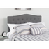 Dark gray tufted upholstered twin size headboard with plush fabric, featuring a stylish and padded design for bedroom decor.