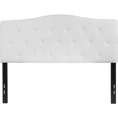 White tufted upholstered full size headboard in fabric with button-tufted design, styled for a modern bedroom.