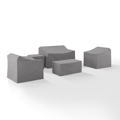 Start2Finish 5-piece outdoor furniture cover set with loveseat, two armchairs, end table, and table protecting furniture from elements.