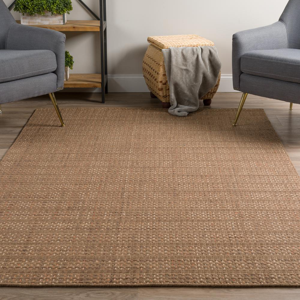 Start2Finish Nepal NL100 Mocha rug in 5x7.6 feet with intricate patterns and warm mocha tones, suitable for living rooms or bedrooms.