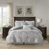 Start2Finish 6-piece cotton comforter bedding set with coordinated pillow shams and decorative pillows on a neatly made bed.