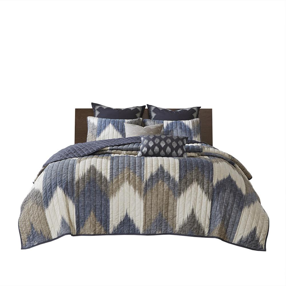 Alpine 3-piece printed cotton quilt set in navy, bedding by Start2Finish with floral and geometric patterns on a bed.