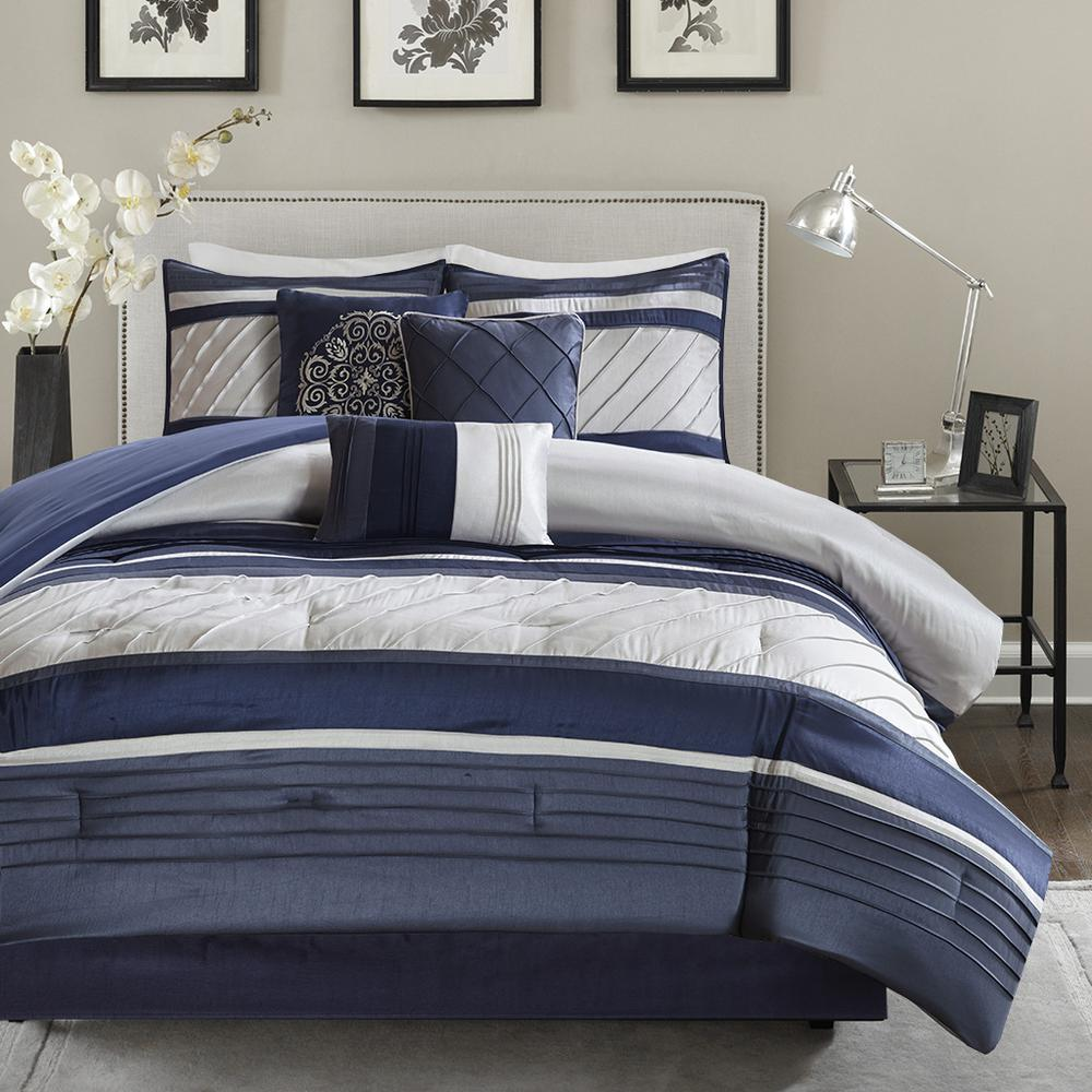 Blaire 7-piece navy comforter set by Start2Finish featuring matching pillow shams and bed linens for a cozy bedding look