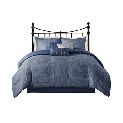 Start2Finish 7-piece printed seersucker comforter bedding set with matching pillow shams on a bed with coordinating linens.