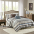 Start2Finish 5-piece Jacquard quilt bedding set with decorative throw pillows, featuring intricate woven patterns on the bedding.