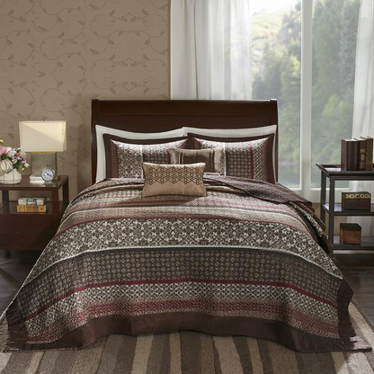 Reversible Jacquard bedspread set with five pieces in elegant patterns, by Start2Finish, displayed on a neatly made bed.