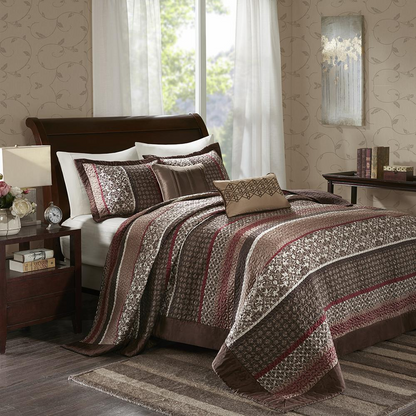 Start2Finish 5-piece reversible jacquard bedspread set with intricate woven patterns and coordinating pillow shams on a neatly made bed.
