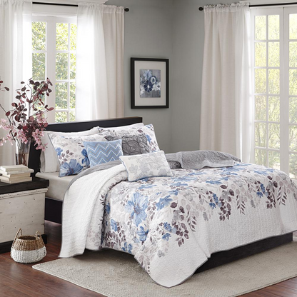 Start2Finish 6-piece printed quilt bedding set with matching throw pillows, featuring colorful floral and geometric patterns.