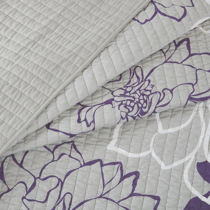 Start2Finish 6-piece printed cotton quilt set with matching throw pillows, featuring colorful floral patterns on a cozy bedding ensemble.