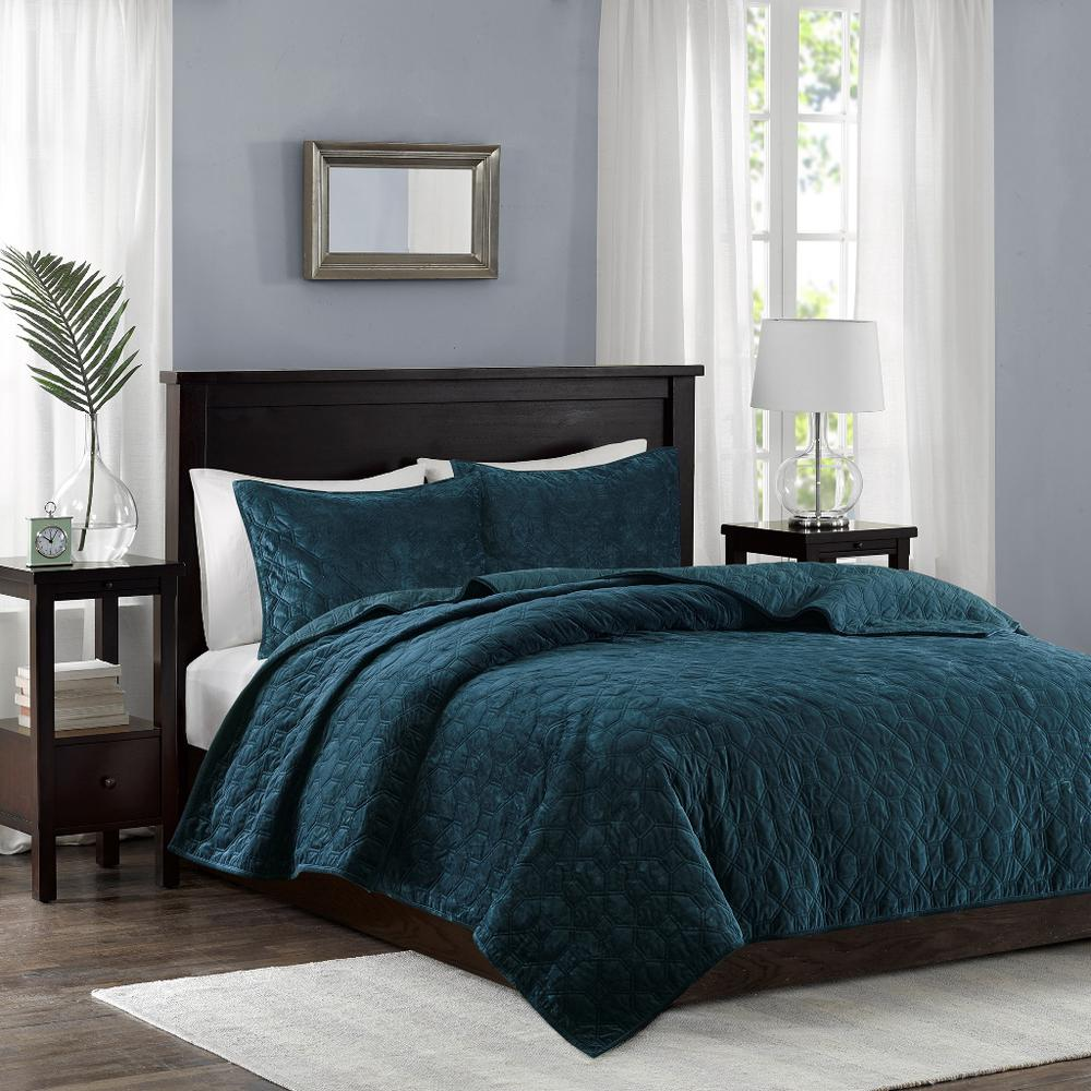 Start2Finish Harper 3-piece velvet teal quilt set with matching pillow shams on a bed, showcasing soft velvet texture and vibrant color.