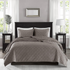 Start2Finish Harper 3-piece velvet quilt set in taupe with matching pillow shams on a bed.