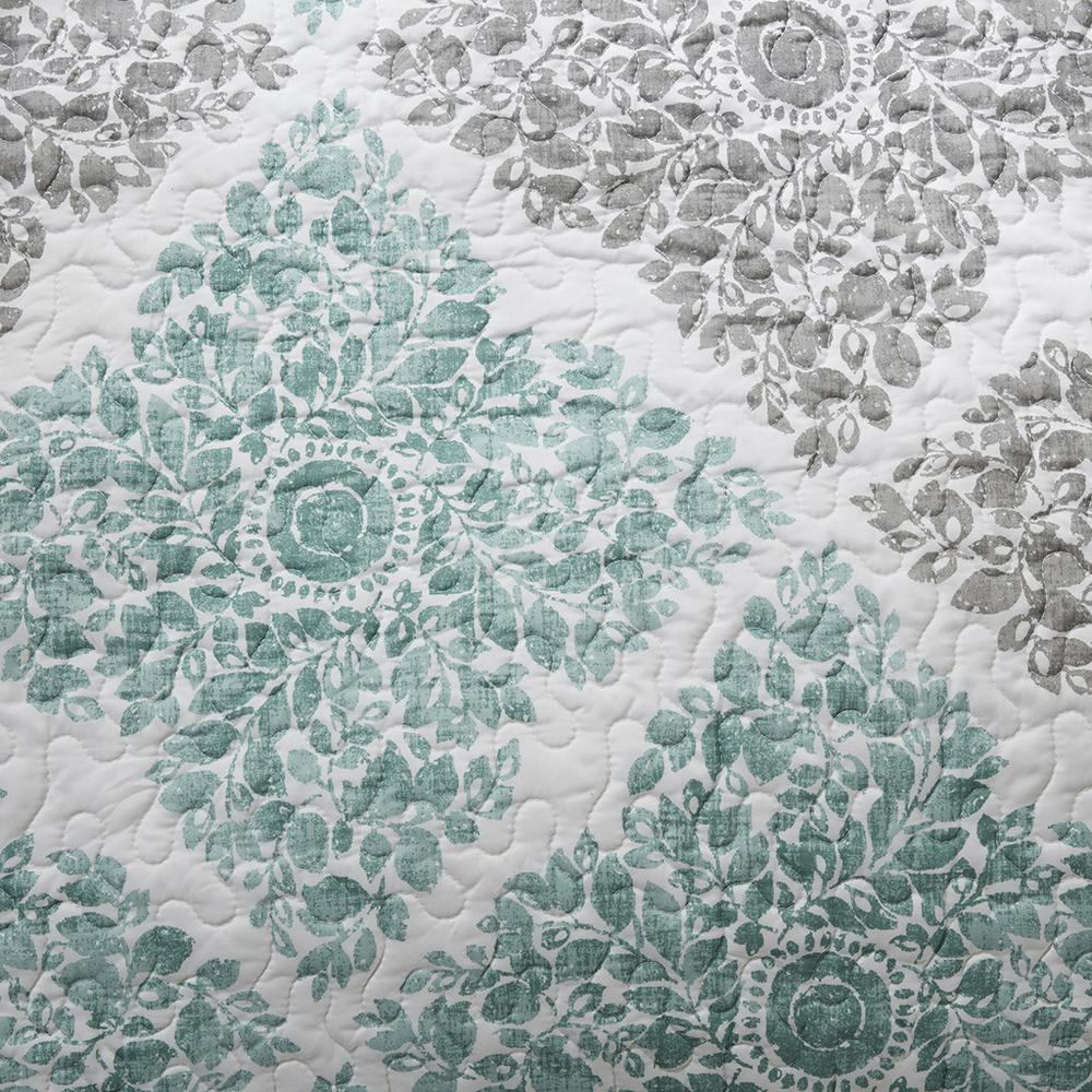 Start2Finish Claire 6-piece reversible aqua bedding daybed cover set with patterned and solid sides, displayed on a bed.