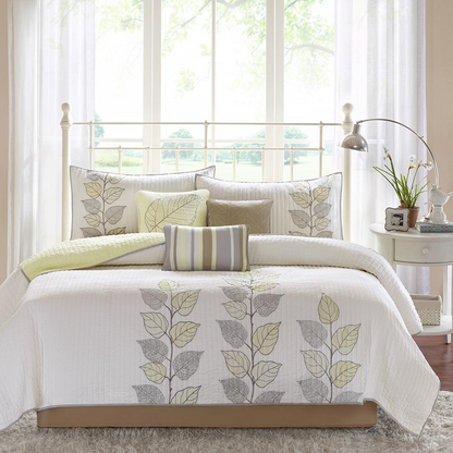 Start2Finish 6-piece embroidered quilt bedding set with matching throw pillows, featuring detailed embroidery and cozy fabric.