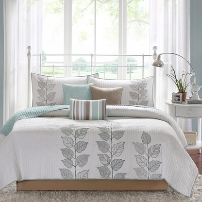 Start2Finish 6-piece embroidered quilt bedding set with matching throw pillows, featuring intricate stitching and decorative patterns.