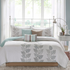 Start2Finish 6-piece embroidered quilt bedding set with matching throw pillows, featuring intricate stitching and decorative patterns.