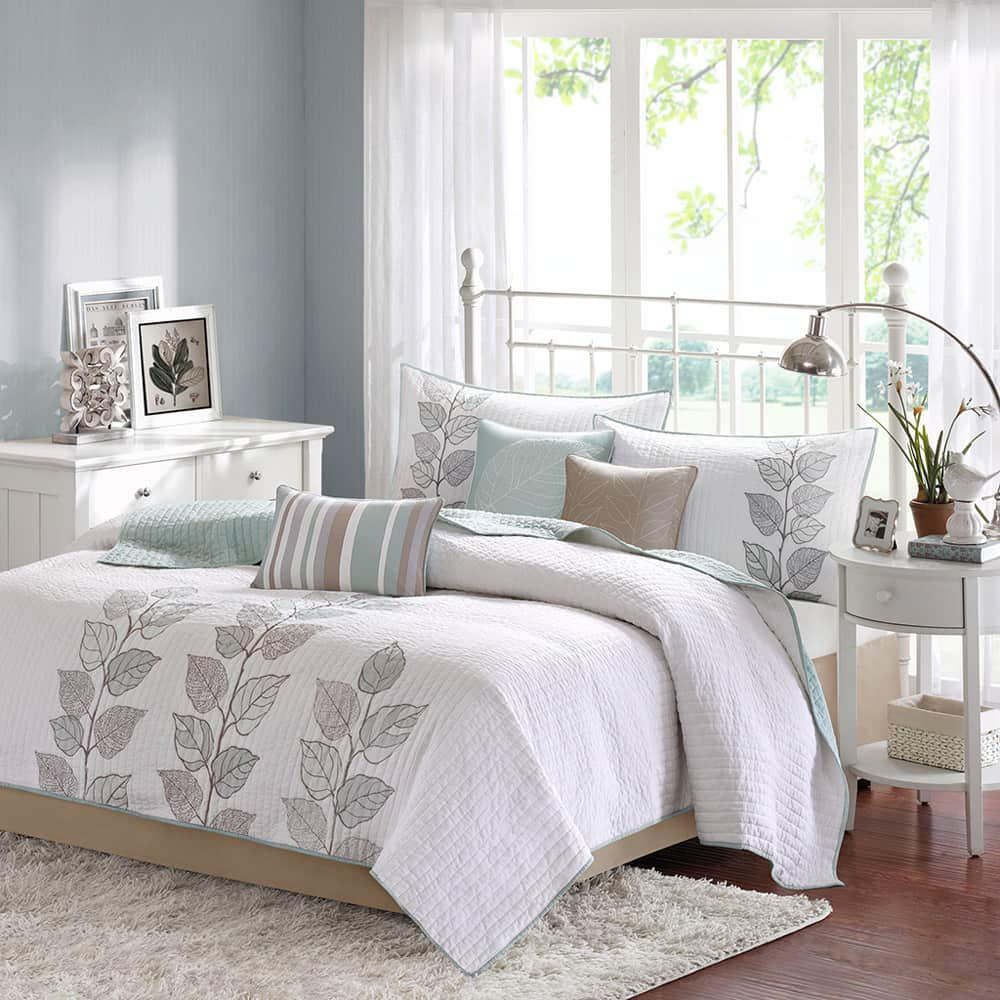 Start2Finish 6-piece embroidered quilt bedding set with matching throw pillows, featuring intricate embroidery and cozy fabric.