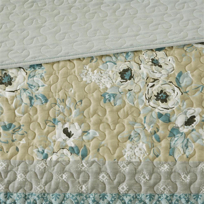 Start2Finish 6-piece cotton quilt set with matching throw pillows, featuring a soft, cozy bedding design in neutral tones.