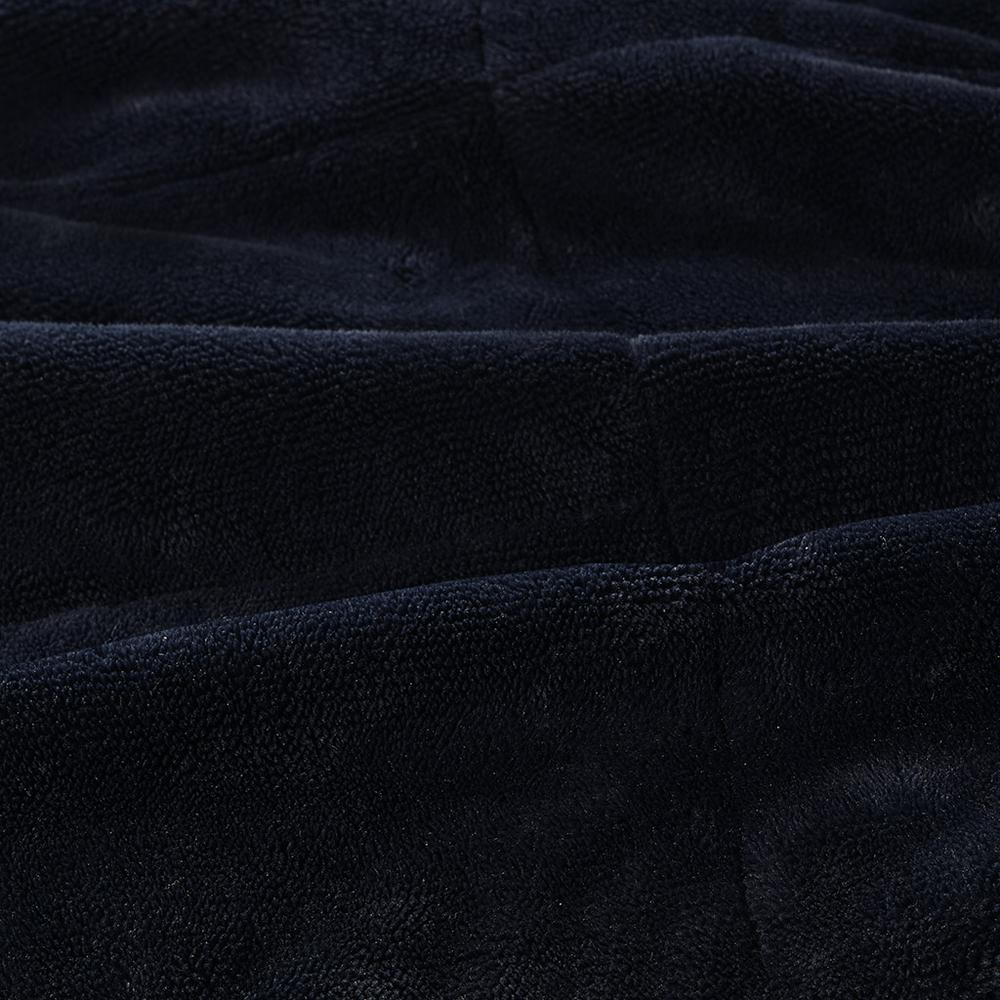 Reversible HeiQ Smart Temperature down alternative bedding blanket by Start2Finish, showing both sides in a cozy bedroom setting.