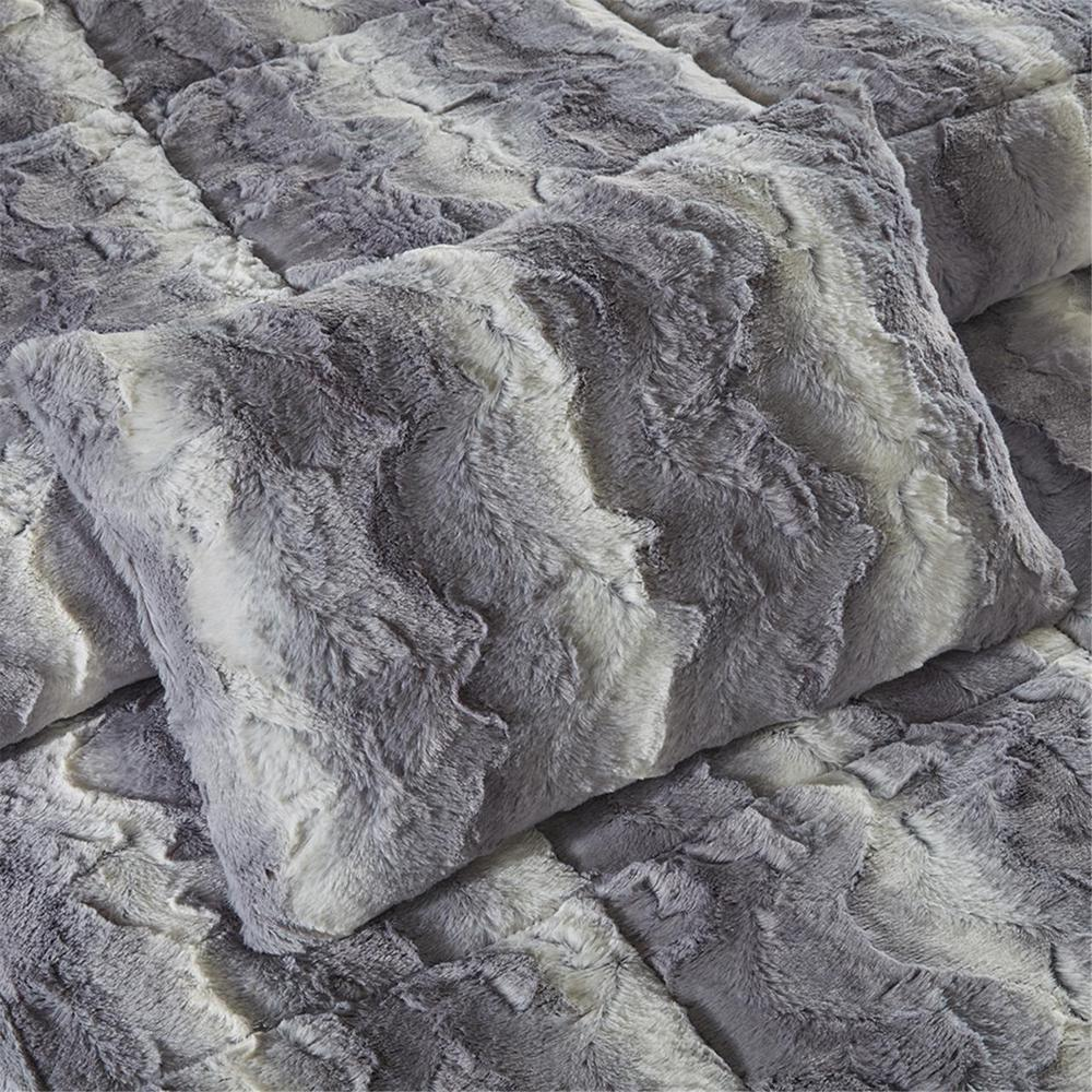 Four-piece faux fur comforter set by Start2Finish, featuring plush, soft bedding in neutral tones with decorative pillows.